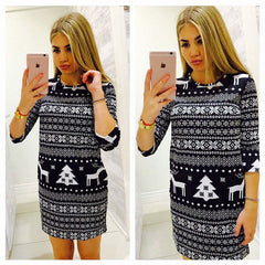Christmas Jumper Sweater Christmas Deer Warm Knitted Top Plus Size worn by a young woman posing in front of a mirror.