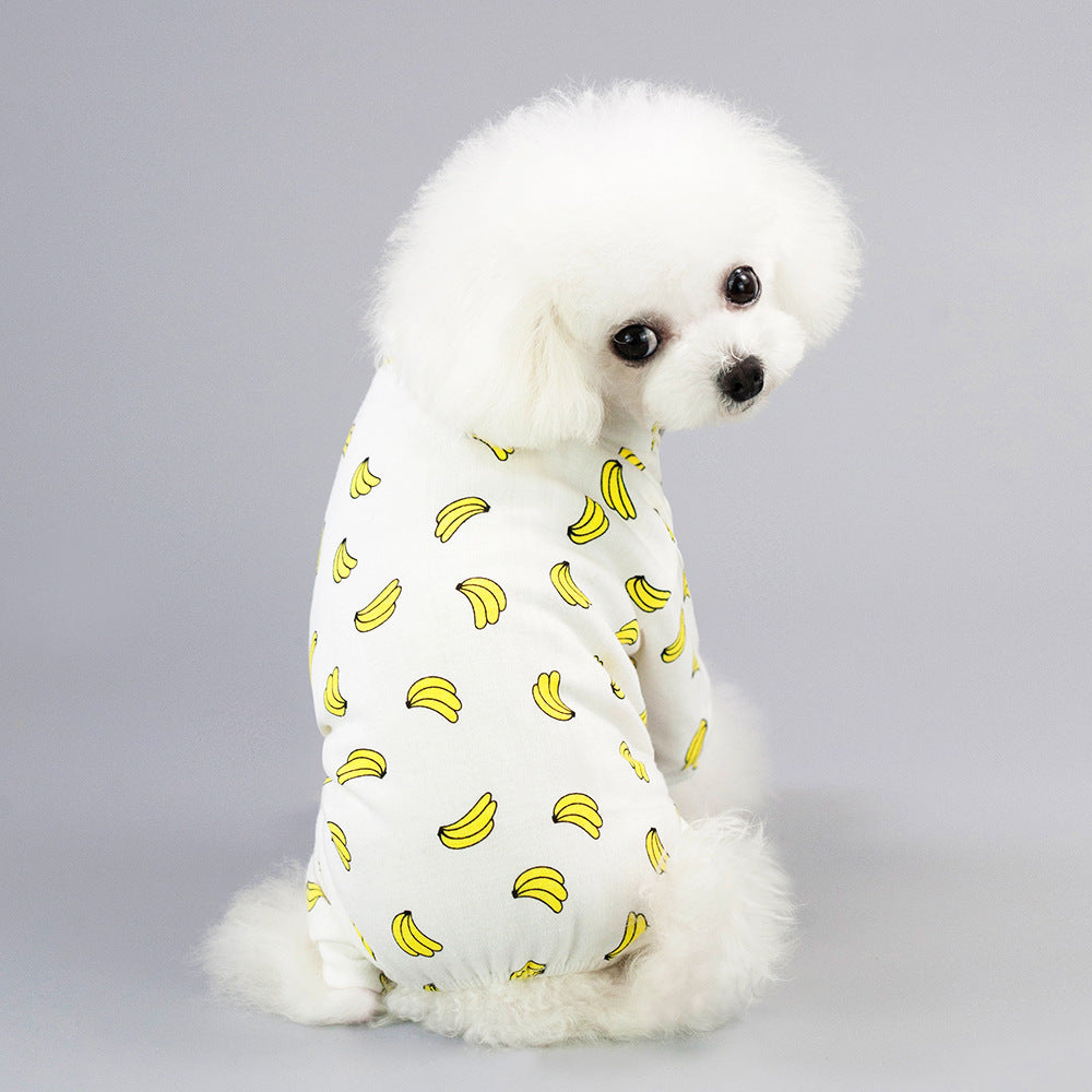 Pet Four-Legged Cotton Home Clothes Dog Pajamas Casual Cartoon Fruit Pattern on a fluffy dog with banana design.
