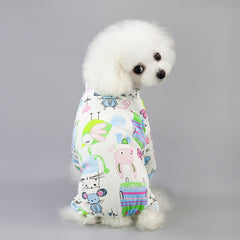 Pet Four-Legged Cotton Home Clothes Dog Pajamas Casual Cartoon Fruit Pattern on a fluffy dog in a playful pose.