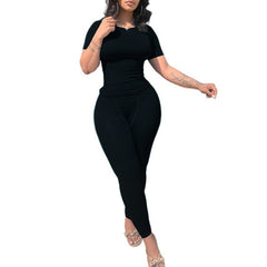 Short Sleeved Pants outfit in black, featuring a short sleeved top and long pants for casual wear and light sports.