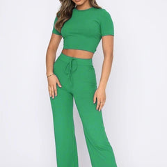 Casual Set Female Solid Color High-elastic in vibrant green with fitted cropped top and flared trousers.