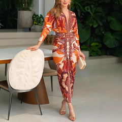 Fashion Personality Printed V-neck Dress Women in vibrant orange and patterned design, perfect for stylish occasions.