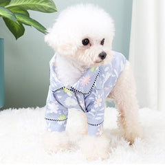 French Small Incense Style Fighting Pet Clothes Dog Pajamas in blue floral design on a fluffy dog.
