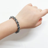 S925 Sterling Silver Retro Domineering Handcraft Bracelet worn on a hand, showcasing its intricate design and craftsmanship.