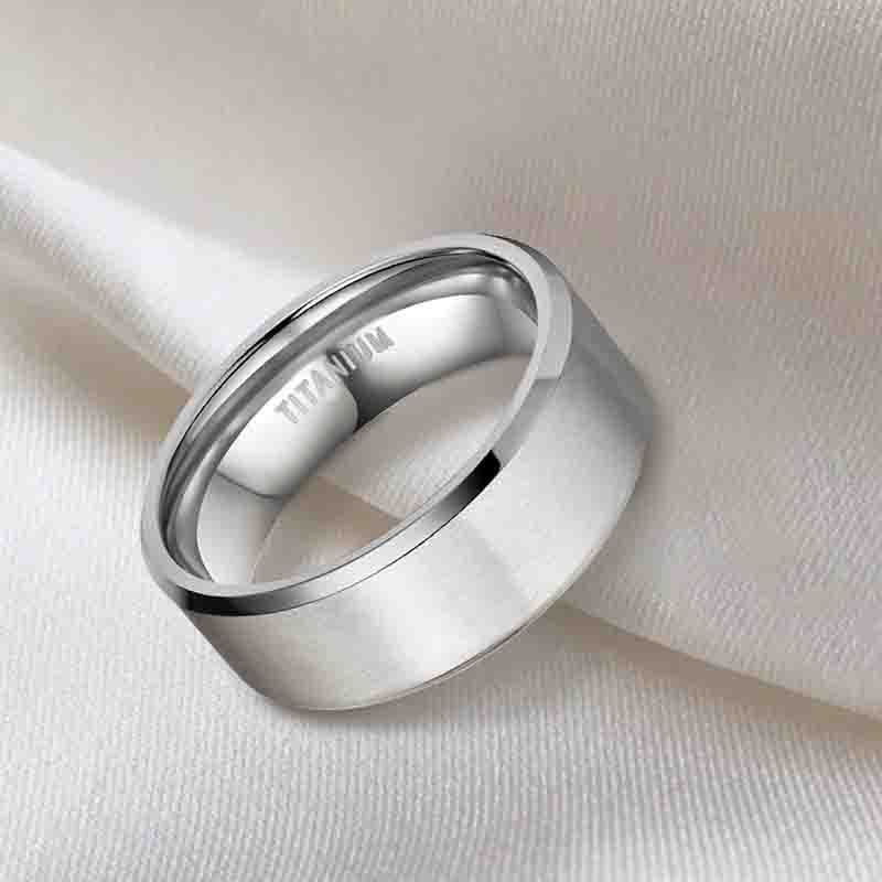 Brushed Wide Face 610mm Unisex Beveled Silver Titanium Ring on a soft background showcasing its sleek design.