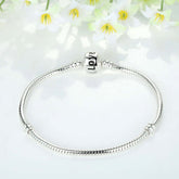 Silver beaded bracelet with 'Love' charm, fashion jewellery for Christmas, unisex style, anti-fatigue health function.