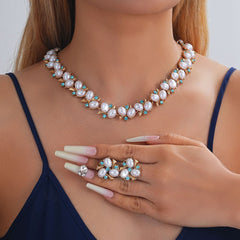 Turquoise Pearl Necklace And Earrings Suite worn by a model showcasing fashion jewellery for a stylish look.