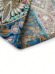 Close-up of the fabric pattern of a women maxi dress, showcasing vibrant colors and detailed tropical design.