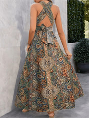 women maxi dress high waisted cross halter neck with tie, back view of tropical patterned dress