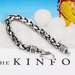 S925 Sterling Silver Retro Domineering Handcraft Bracelet on a light background with decorative hook clasp.