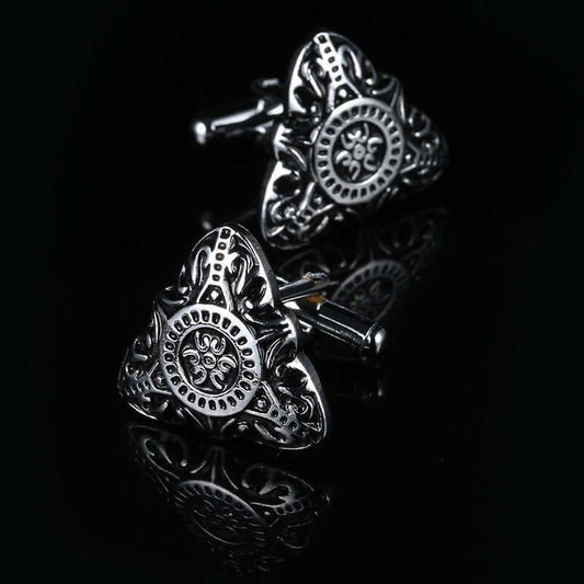 Discover the Most Personality-Enhancing Cufflinks According to Experts featuring ornate silver designs.