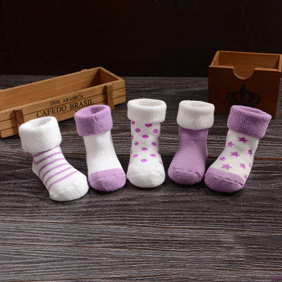 Newborn cotton children's socks terry socks in lavender and white, featuring playful patterns and cozy comfort.