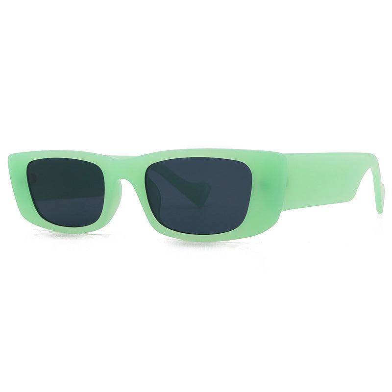 UV400 Cross-border Retro Fashion Small Frame Men And Women Sunglasses in translucent green with dark lenses.