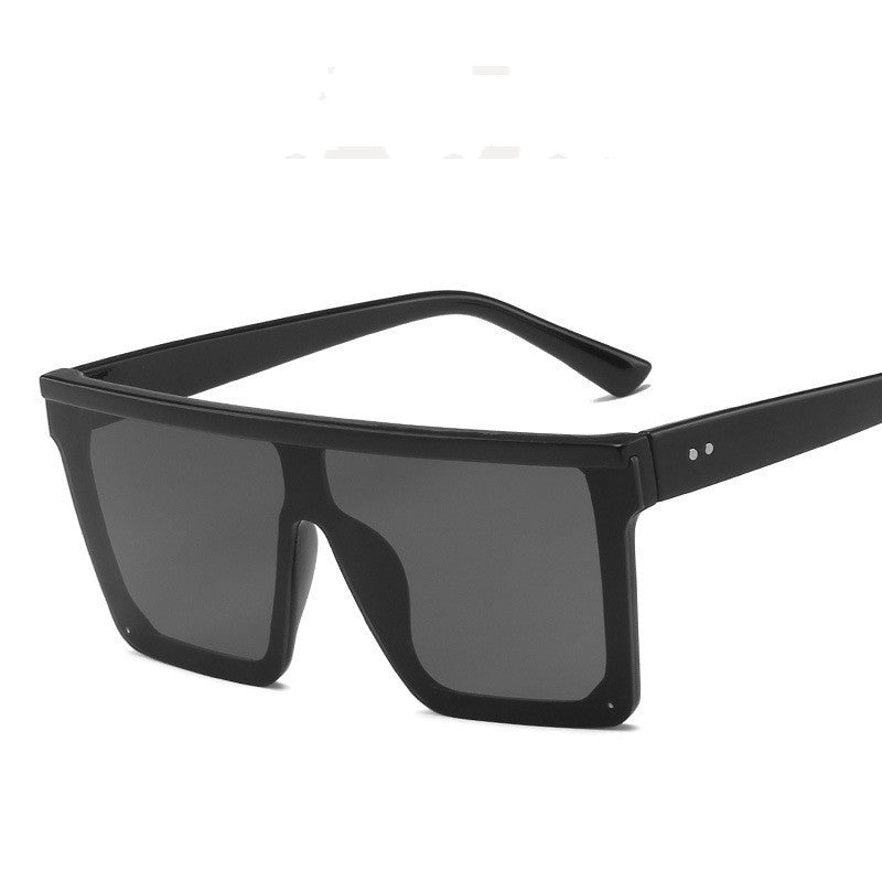 Sunglasses Men And Women Retro Rice Nail Sunglasses in black frame and tinted lenses, perfect for fashion jewellery lovers.