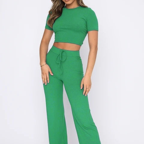 Casual Set Female Solid Color High-elastic in vibrant green with fitted cropped top and flared trousers.