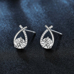 Moissanite 925 Sterling Silver Fishtail Cross Stud Earrings with sparkling geometric design.