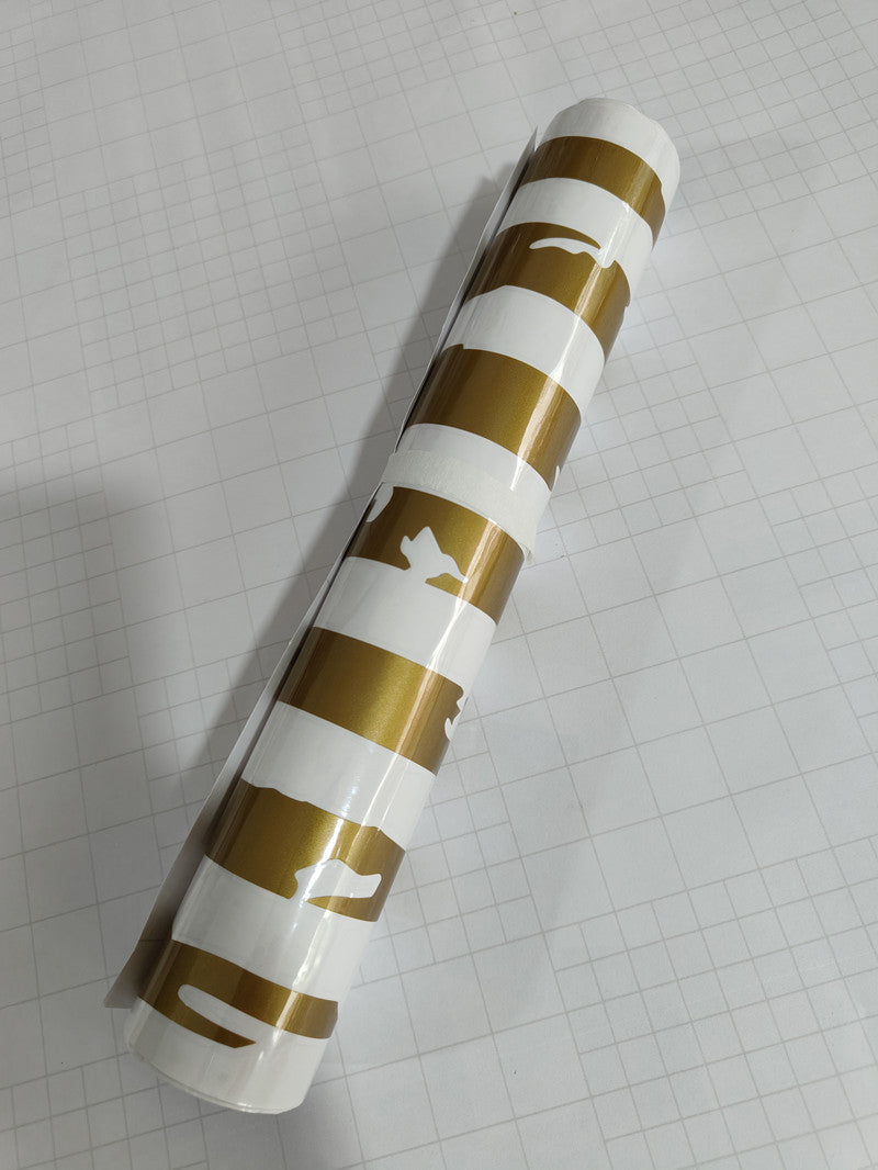 Car sticker modification front end in white and gold design on a roll for stylish vehicle upgrades.