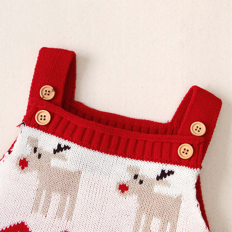 Children's sling Christmas elk jumper with festive reindeer pattern and wooden buttons.