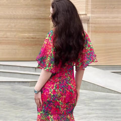 Sexy Elegant Graceful Short Sleeve Sweet Dress in vibrant floral pattern, showcasing ruffled sleeves and a fitted design.