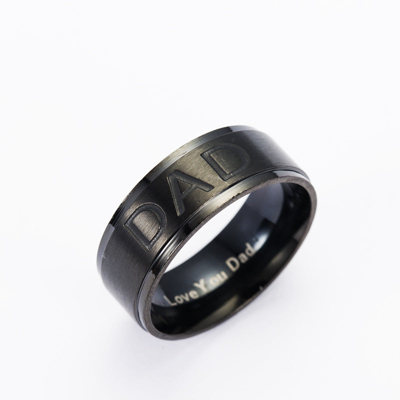 Monogram ring titanium steel ring featuring a black band engraved with 'DAD' for fashion jewellery.