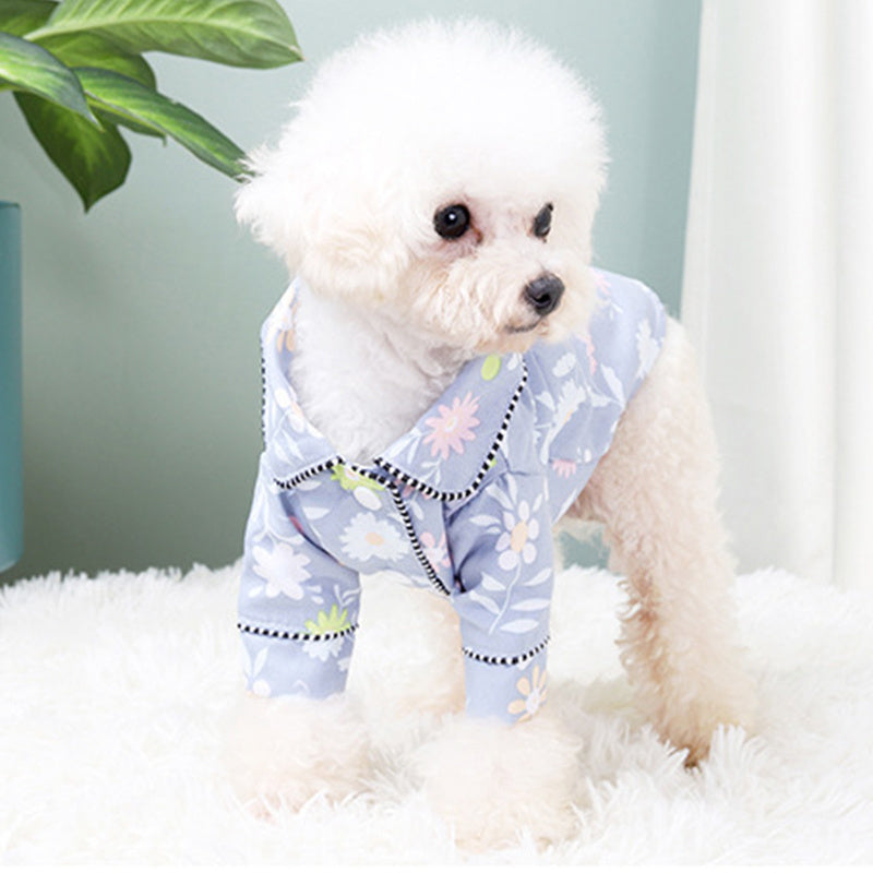 French Small Incense Style Fighting Pet Clothes Dog Pajamas in blue floral design on a fluffy dog.