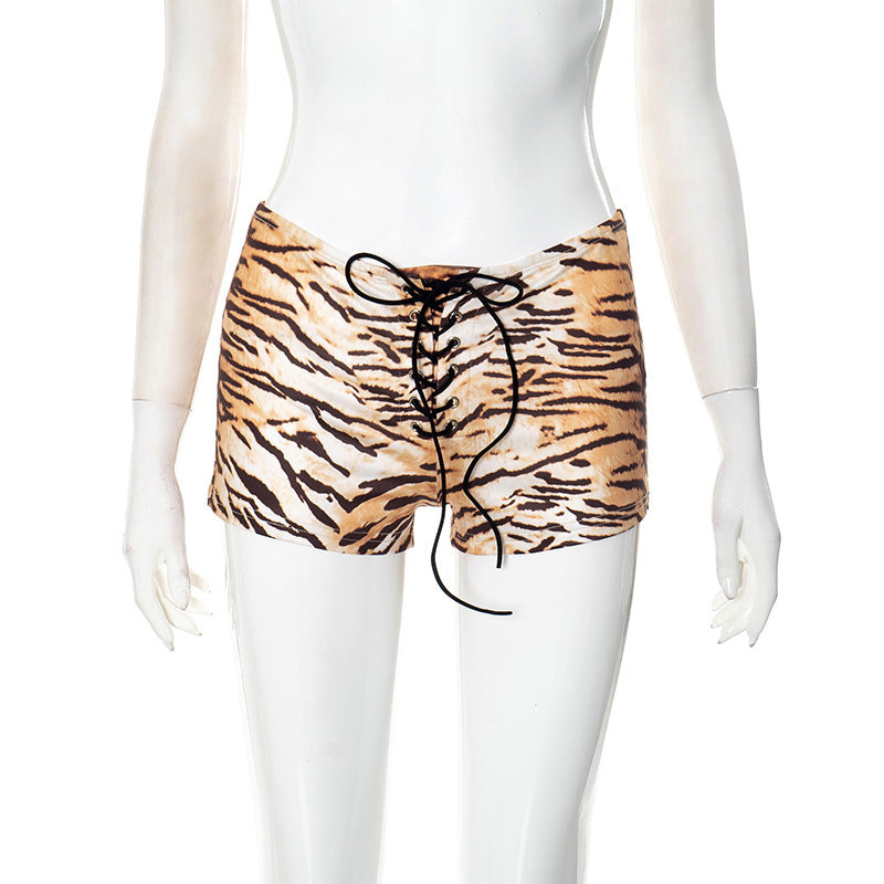 Women's Sexy American Hot Girl Tiger Stripe Pattern Rope Shorts displayed on a mannequin, showcasing a trendy tiger print design.