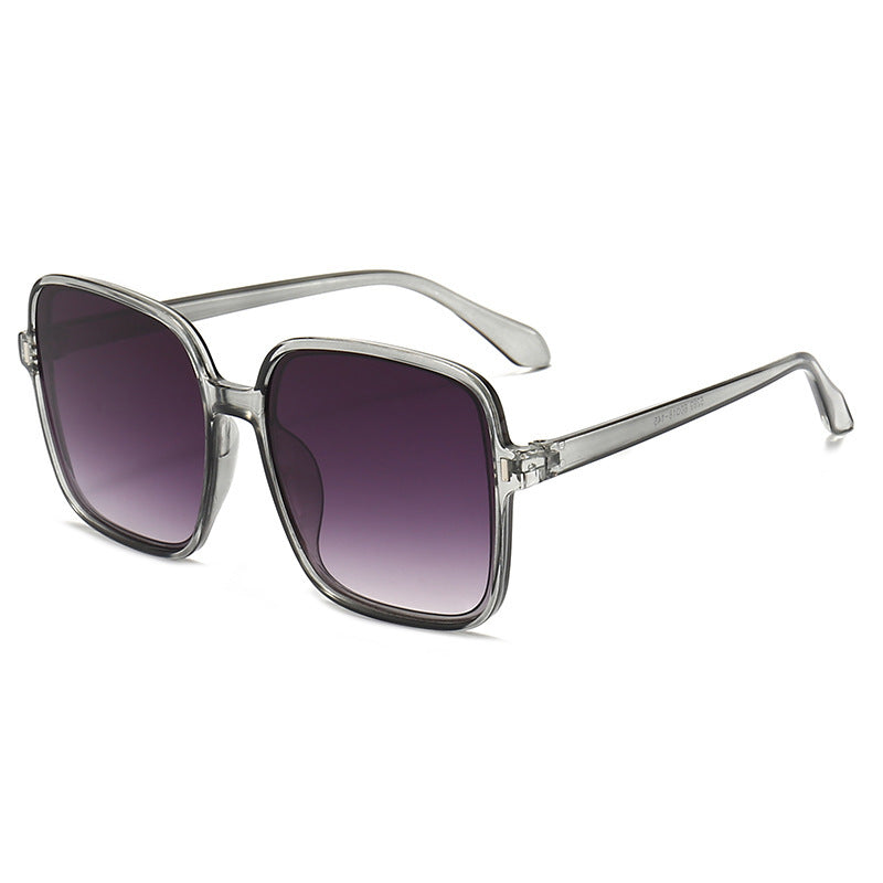 Men And Women With Fashion Simple Sunglasses in transparent gray with gradual shades.