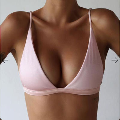Bikini women's swimsuit top in soft pink fabric, highlighting a sexy, open-back design for women's fashion.