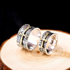 Character Thai S925 Silver Jewelry rings on wooden surface, showcasing geometric design and adjustable sizes.