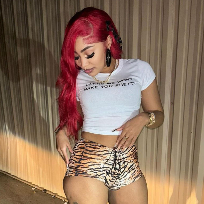Women's Sexy American Hot Girl Tiger Stripe Pattern Rope Shorts worn with a trendy crop top, showcasing a stylish look.