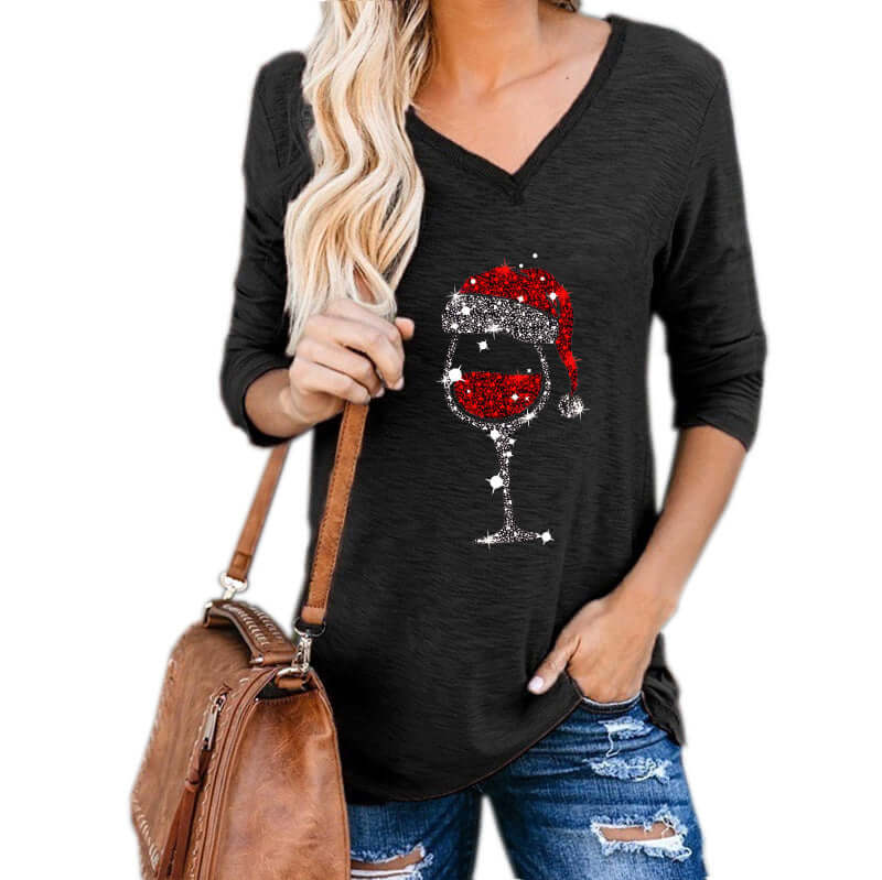 plus size Christmas wine glass top Women Clothing featuring a festive wine glass graphic and casual design.