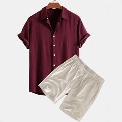 Men's Solid Color Casual Short-sleeved Shirt Shorts Suit in burgundy with beige shorts on plain background.