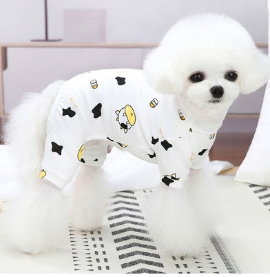 Cotton Cute Pet Pajamas Puppy Dog Clothes Spring And Autumn on a fluffy dog in casual style with a bear and cow pattern.