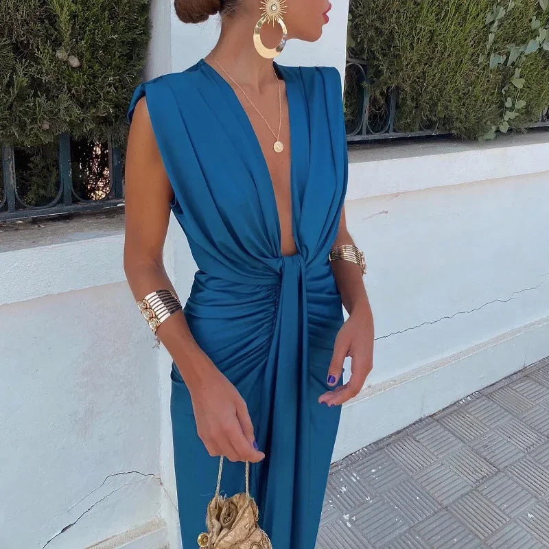 Solid Color Lace High Waist V-neck Dress in teal with elegant accessories and a stylish look.