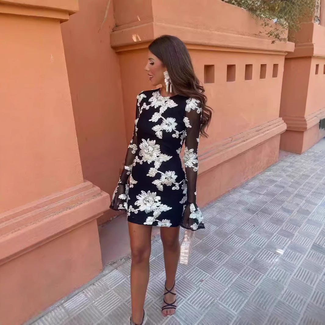 Backless Bell Sleeve Sheath Sexy Dress featuring floral design and sheer sleeves, perfect for urban style fashion.