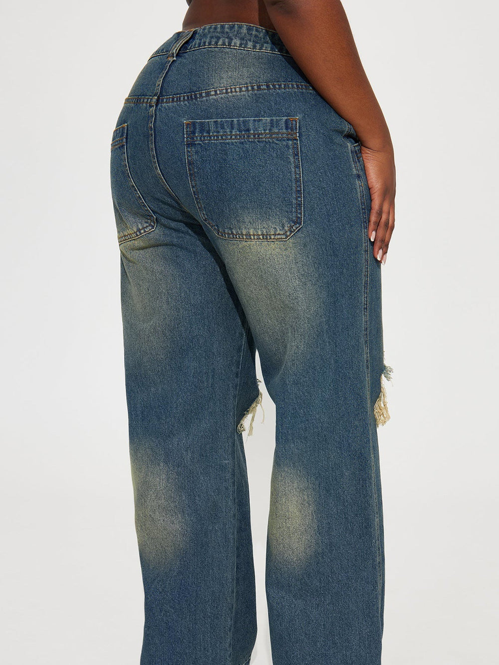 Retro Heavy-duty Washed Knee Ripped Wide-legged Jeans showcasing the back view with distressed detailing in sea blue.