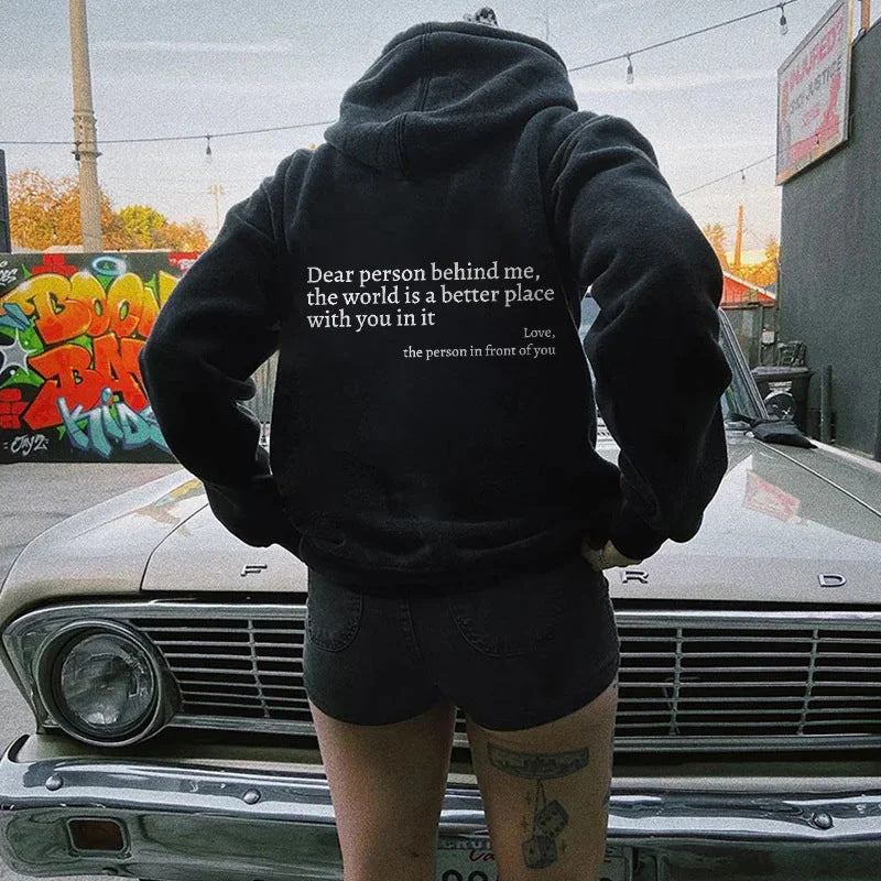 printed hoodie with pockets, featuring a motivational quote on the back, ideal for casual wear.