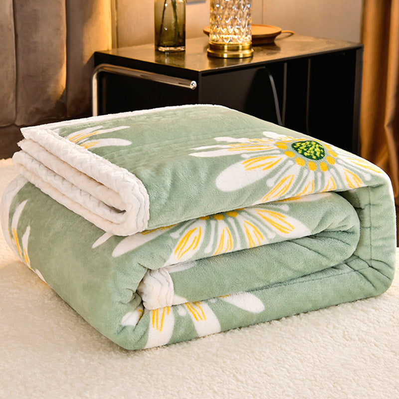Cashmere Three-layer Blanket Thickened Warm Feather Silk Blanket folded and displayed on a cozy surface.