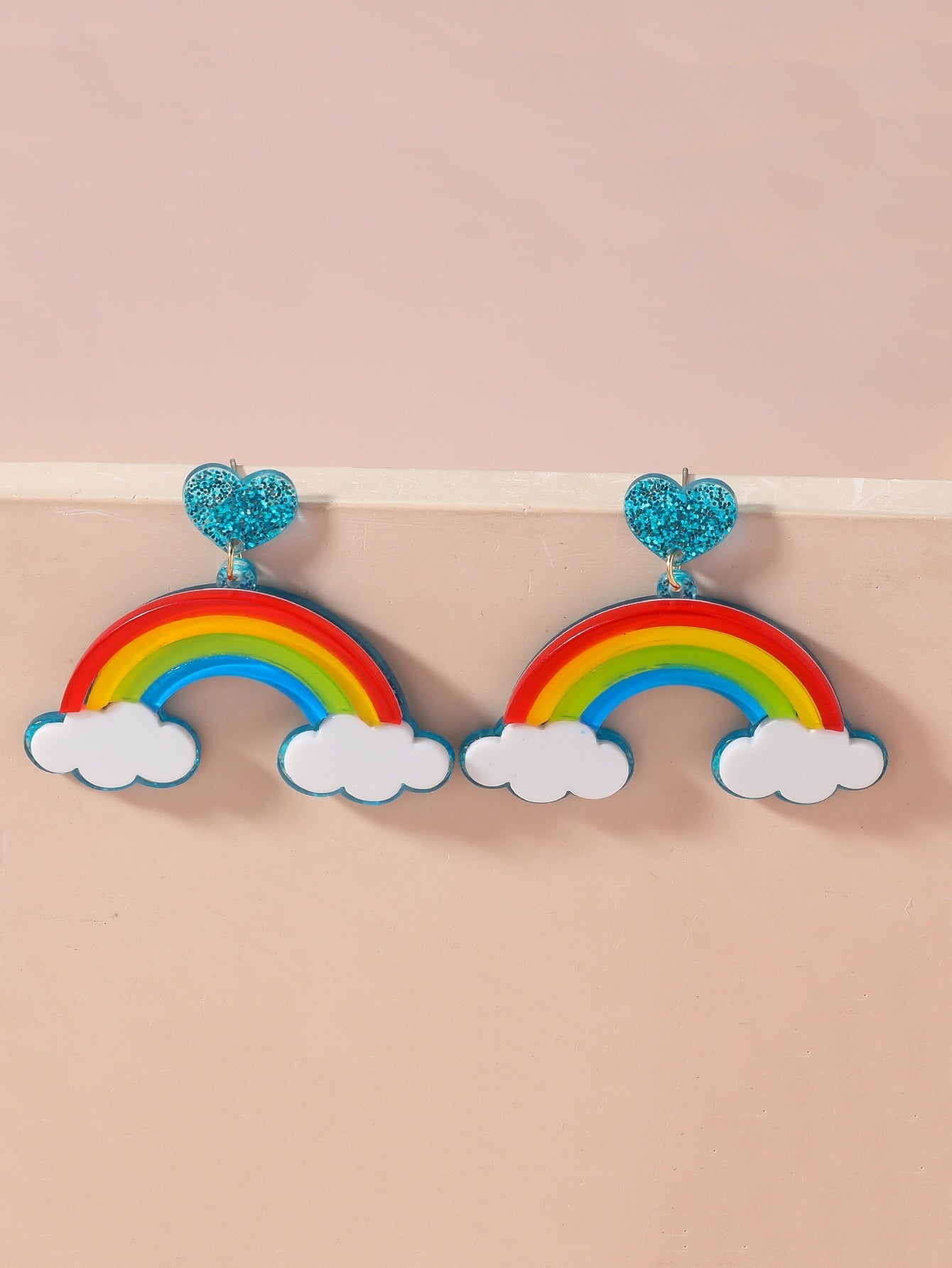 Multi-layer Stereo Acrylic Rainbow White Clouds Heart-shaped Earrings with colorful rainbows and glittery heart tops.