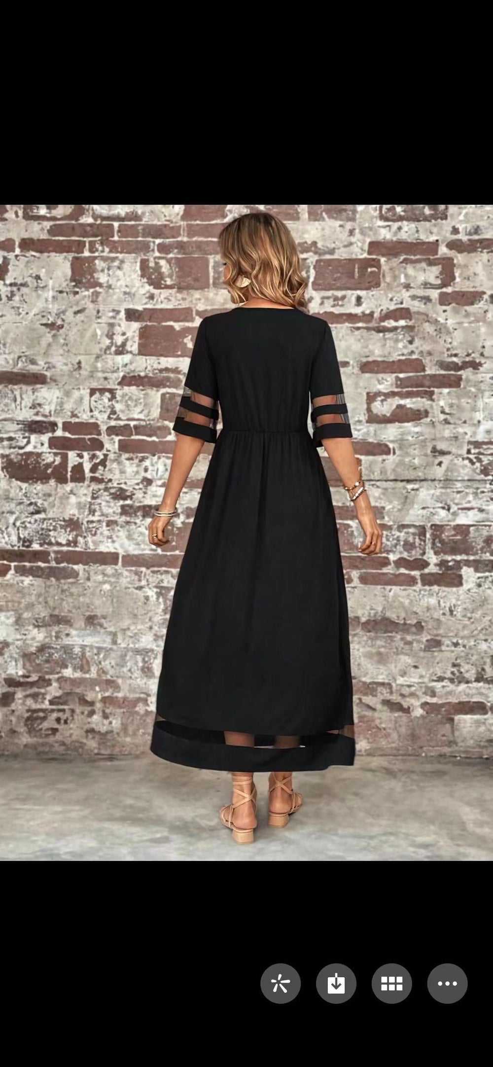 Back view of the New Hot Sale Five-quarter Sleeve Mesh Patchwork Round Neck Pocket Dress on a model against a brick wall.