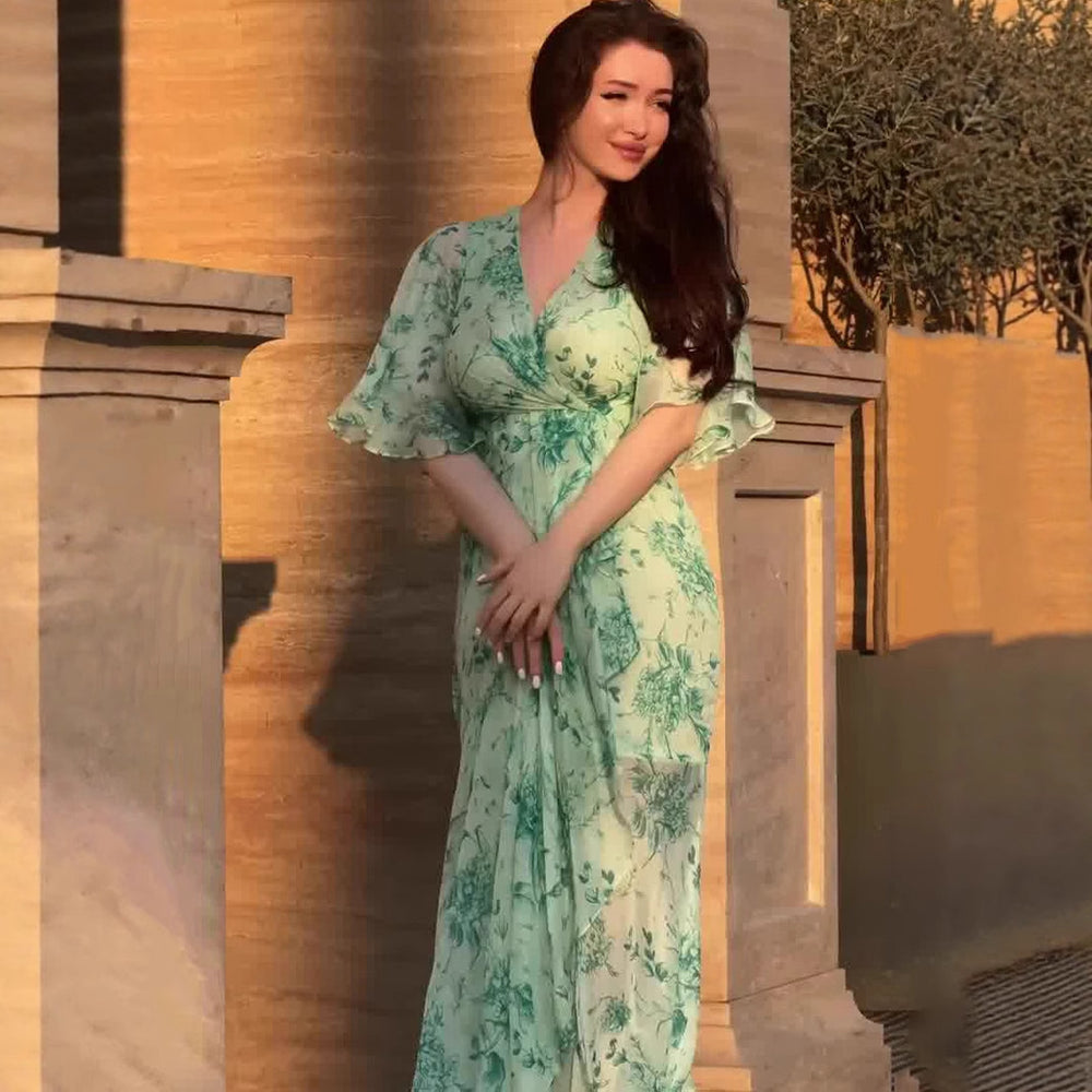 Soft Fresh And Sexy Short Sleeve Floral Dress in green floral pattern with flowing sleeves, perfect for summer fashion.