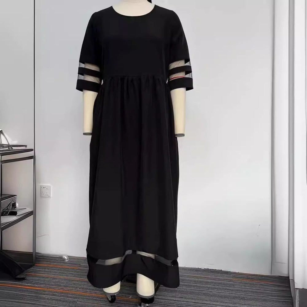 New Hot Sale Five-quarter Sleeve Mesh Patchwork Round Neck Pocket Dress in black, featuring a fishtail skirt and regular sleeves.