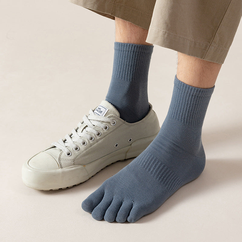 Sweat Absorbing Japanese Solid Five Toe Socks worn with sneakers, showcasing sweat absorption and solid color design.