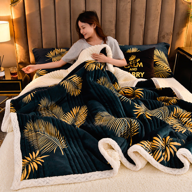 Cashmere Three-layer Blanket Thickened Warm Feather Silk Blanket on a bed with a woman enjoying comfort and style.