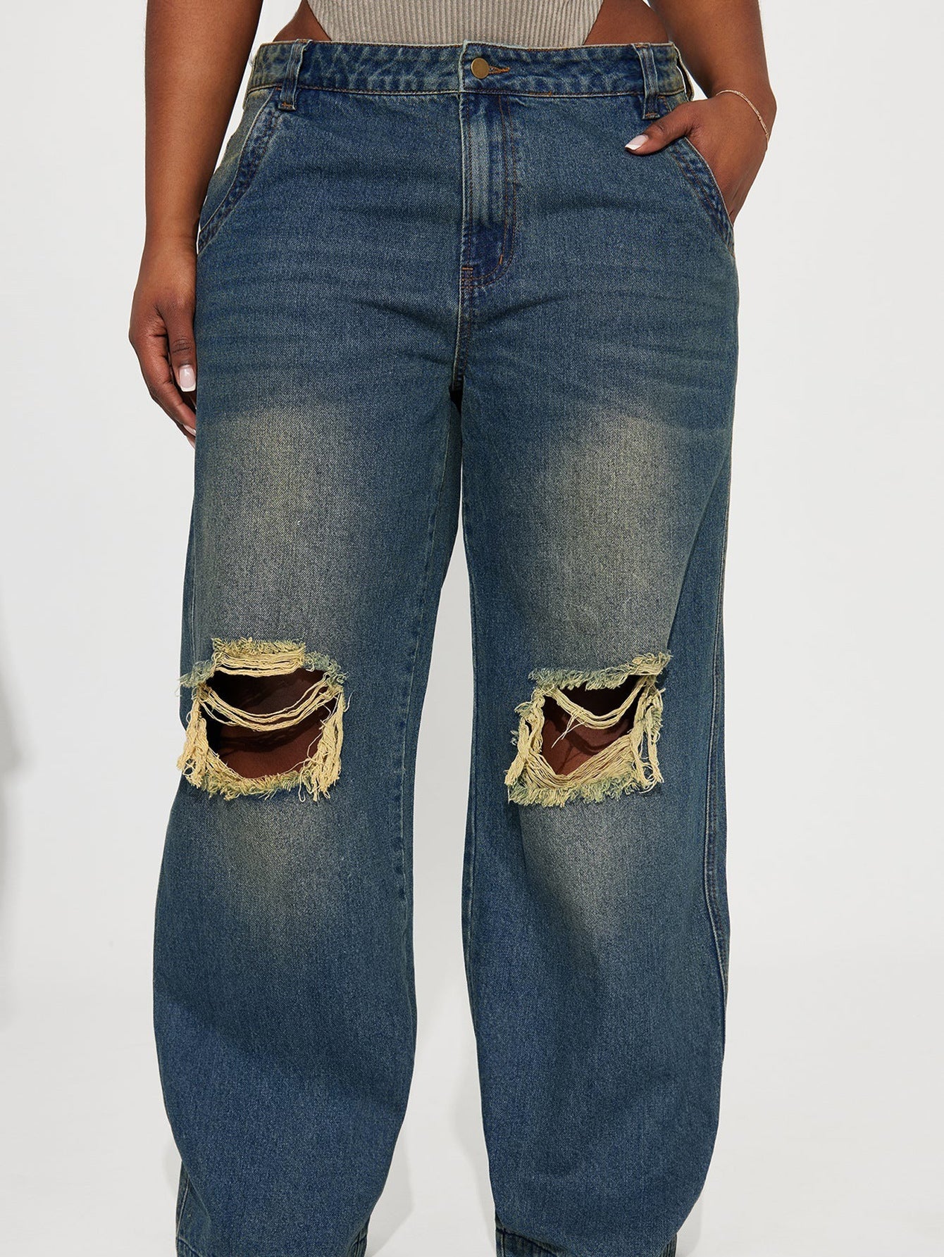 Retro Heavy-duty Washed Knee Ripped Wide-legged Jeans in sea blue denim with distressed knee details.