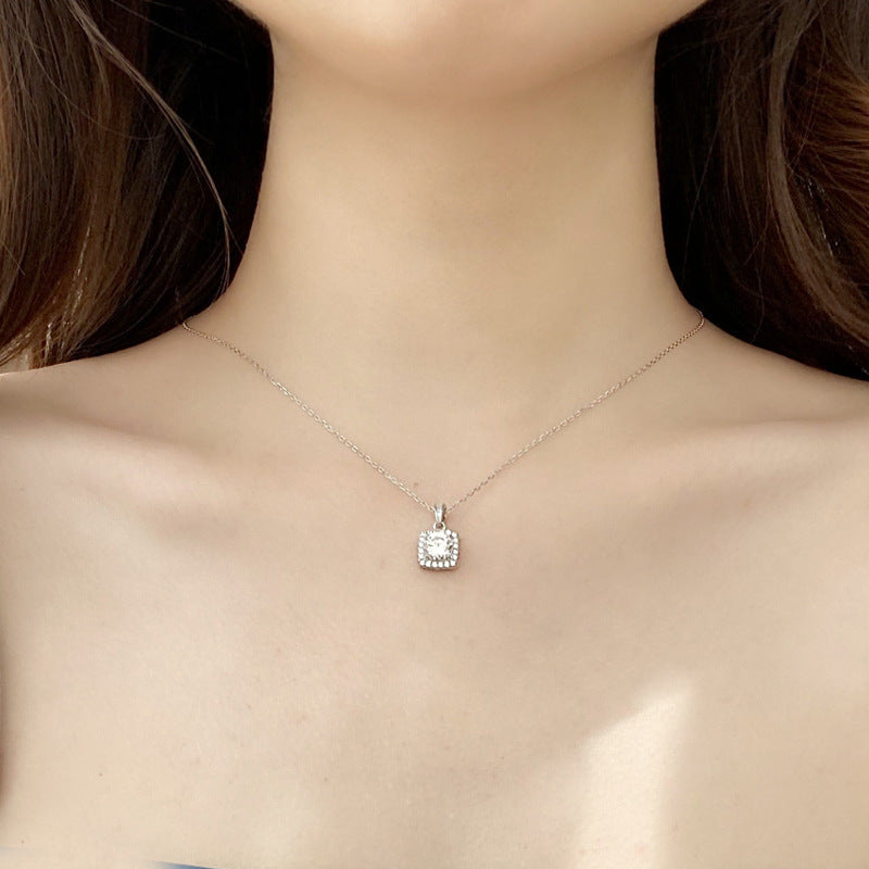 S925 Sterling Silver Jewelry Moissanite Pendant Necklace worn by a model, showcasing its stunning design and elegance.