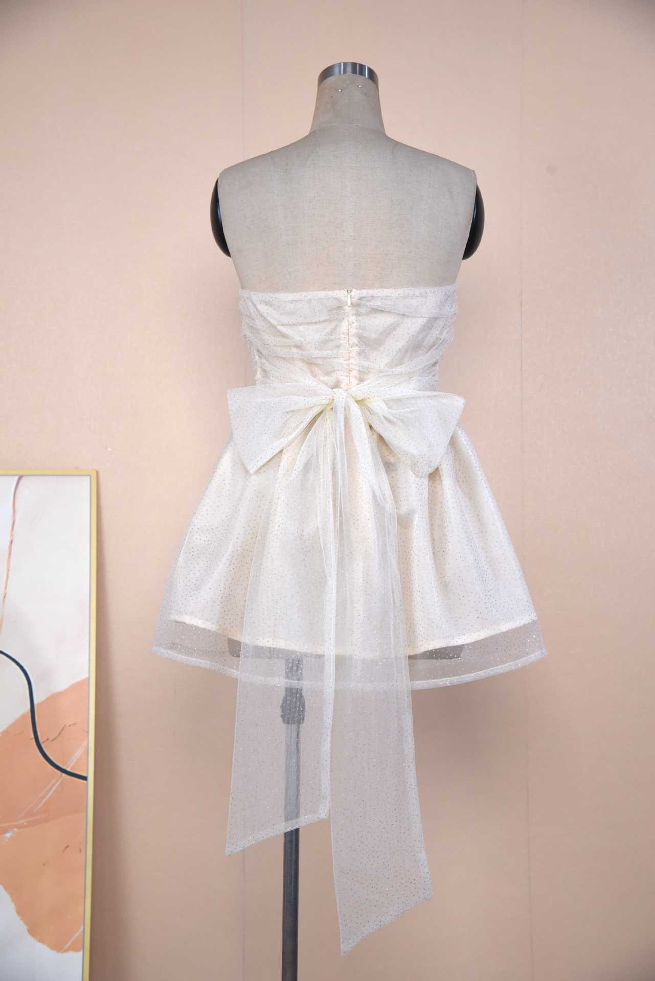 Back view of Tube Top Lace Dress With Back Bow-knot Summer Fashion Temperament Mesh Stitching Off-neck Short Skirt.