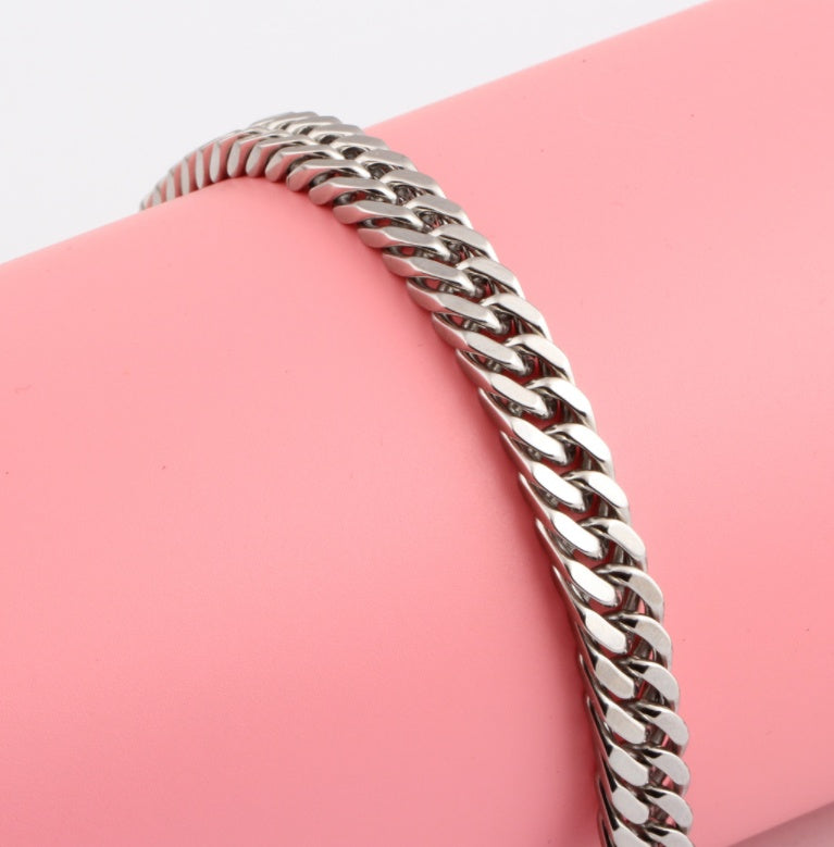 Titanium steel bracelet showcasing a sleek geometric design in silver, perfect for fashion jewellery enthusiasts.