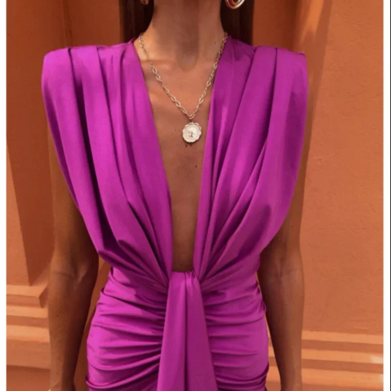 Solid Color Lace High Waist V-neck Dress in vibrant purple, featuring a deep V-neck and elegant draping details.