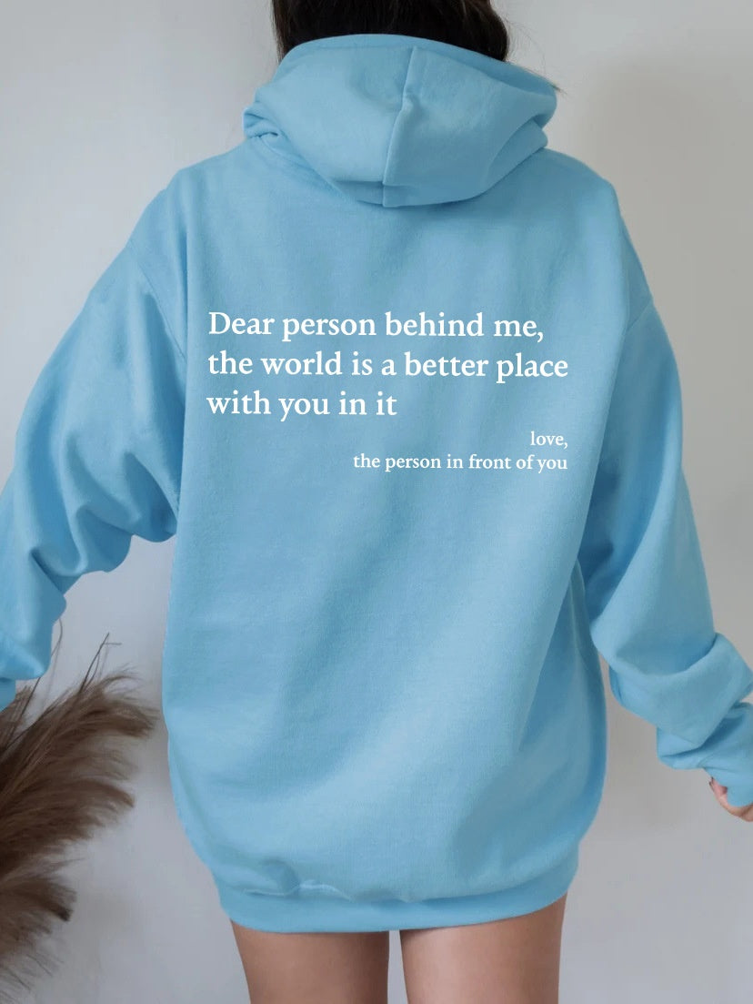 Printed hoodie with pockets in blue featuring a motivational quote on the back.